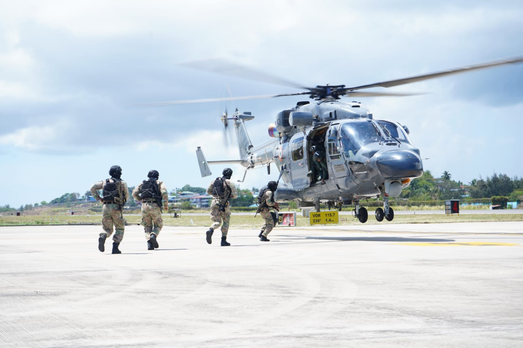 Special Forces team boarding tactical military aircraft with UAV and aerial drone mission systems